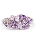 Front view: The Avalanche Berry Mousse Ring showcasing its artistic arrangement of lilac and light purple sapphires in yellow gold. Designed by Bena Jewelry in Montreal, Canada.