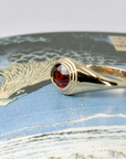 BEZEL OVAL PYROPE | Yellow Gold Ring