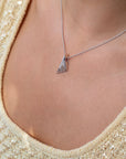 Bena Jewelry Diamond Pyramid Pendant in 14k white gold, a striking unisex necklace with sharp geometric angles, set with white and golden-brown diamonds for a bold, architectural statement look.