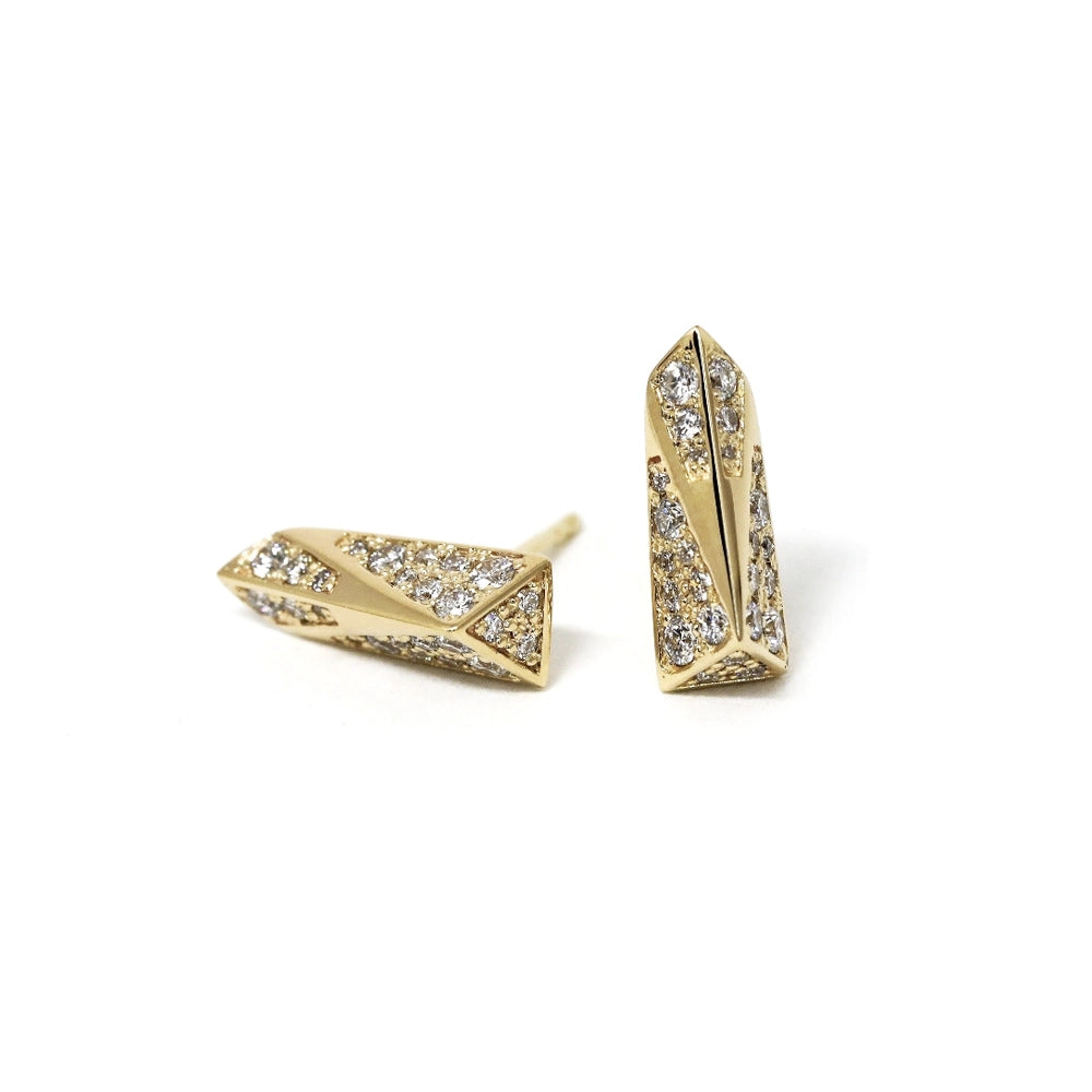 Product photography on white background of a pair of edgy modern designer unisex diamond stud earrings. This high end piece of jewellery was designed in Canada by fashion brand Bena Jewelry.