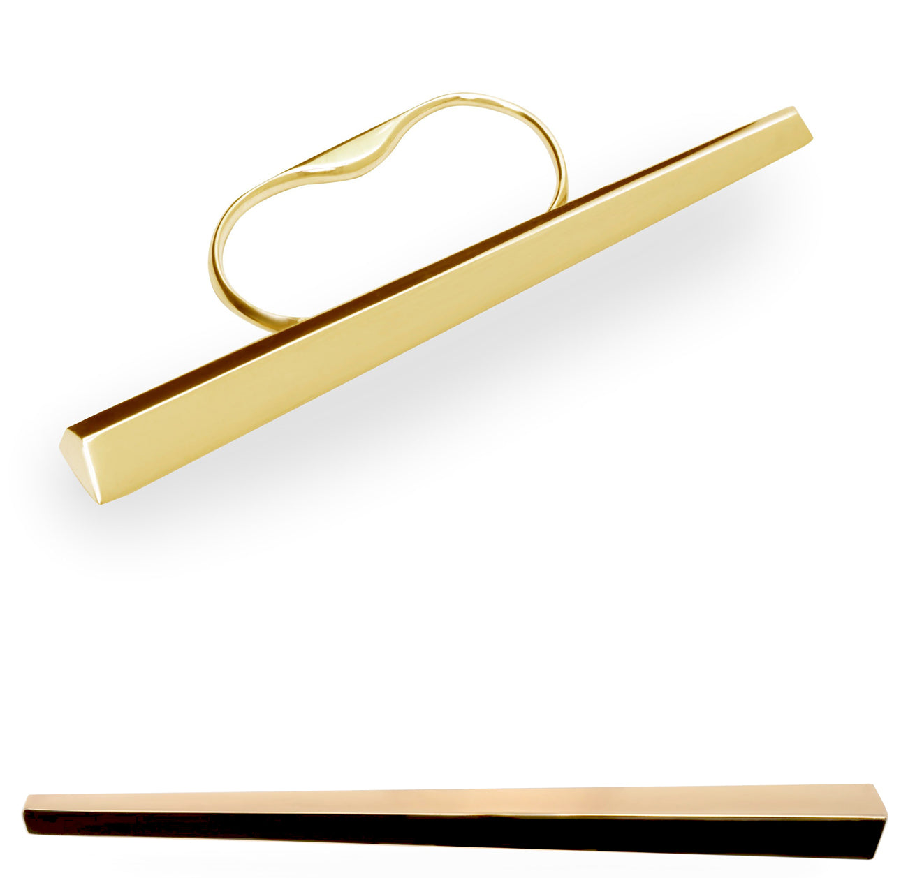 The Grand Punch ring bears the recognizable signature of Bena Jewelry: a play of volumes and a study of shapes that highlights the contrast between light and shadow. It is seen here on a white background from two different angles. It's a long, geometric piece in solid yellow gold, the full width of a fist.