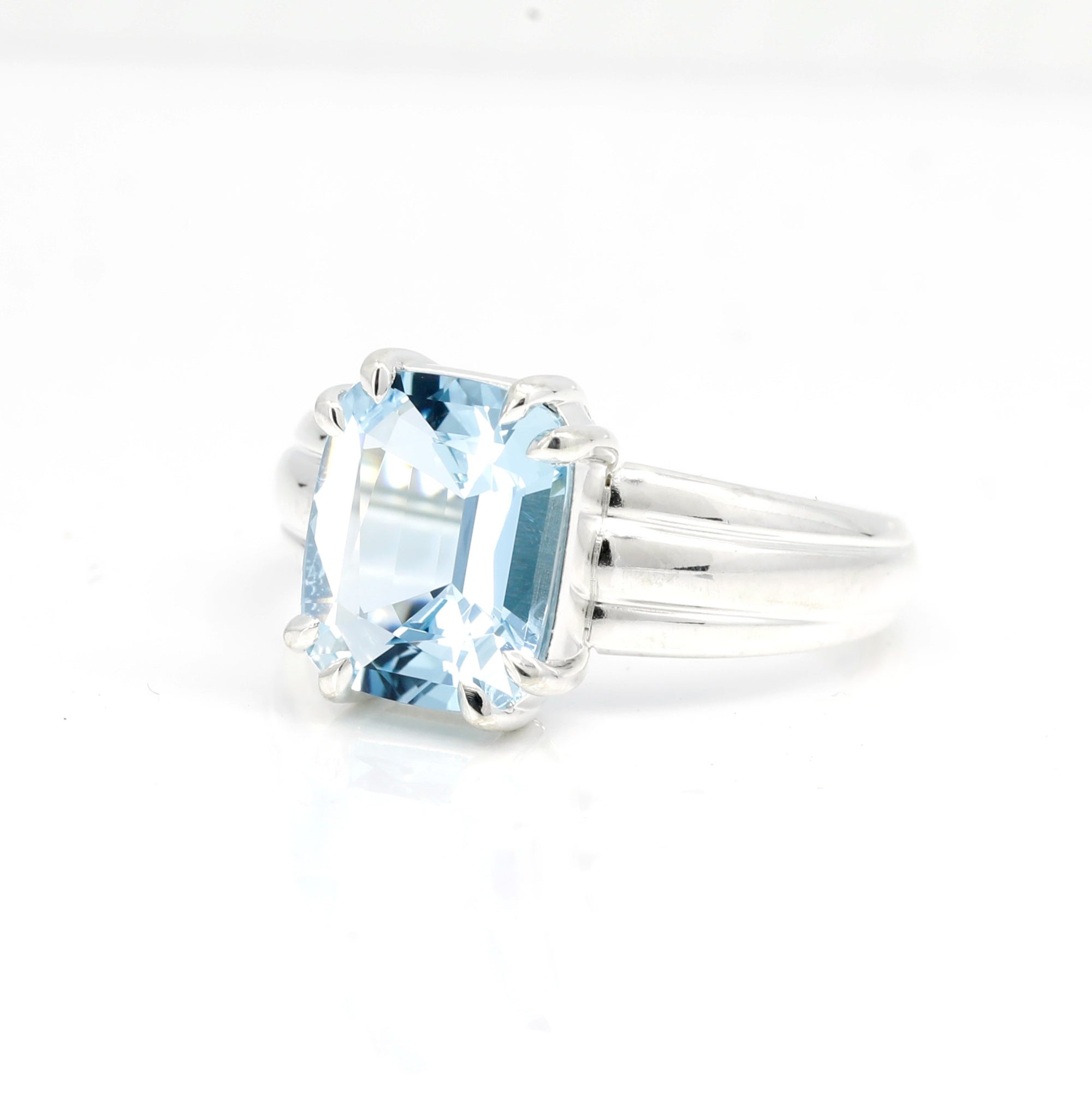 Side angle: Highlights the gemstone’s size and the clean lines of the silver band. Custom-made by Bena Jewelry in Montreal, Canada.