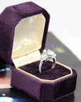 designer engagement ring made in montreal custom made with natural and lab grown diamonds in purple engagement ring jewelry box custom made in montreal by bena jewelry on white background