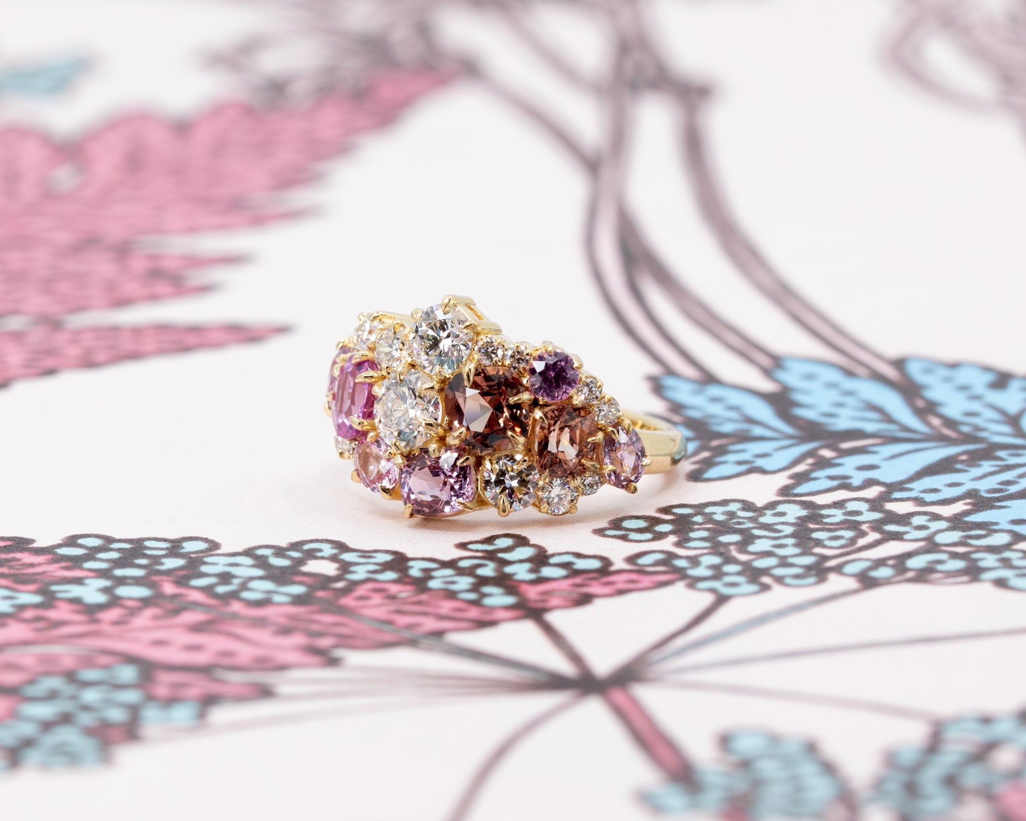 Side view: Highlights the depth and brilliance of the gemstones, set in a sleek yellow gold band. Custom-made by Bena Jewelry, Montreal, Canada.