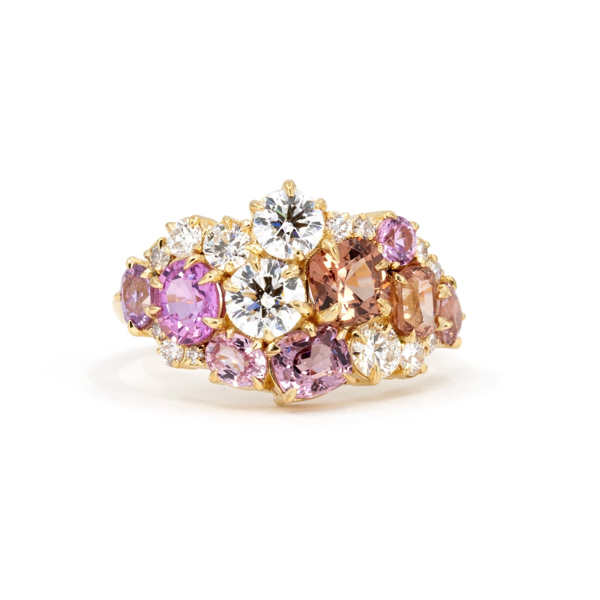 Front view: The Avalanche Peach & Pink Ring showcasing its artistic arrangement of peach and pink gemstones with diamonds in a polished yellow gold setting. Designed by Bena Jewelry in Montreal, Canada.