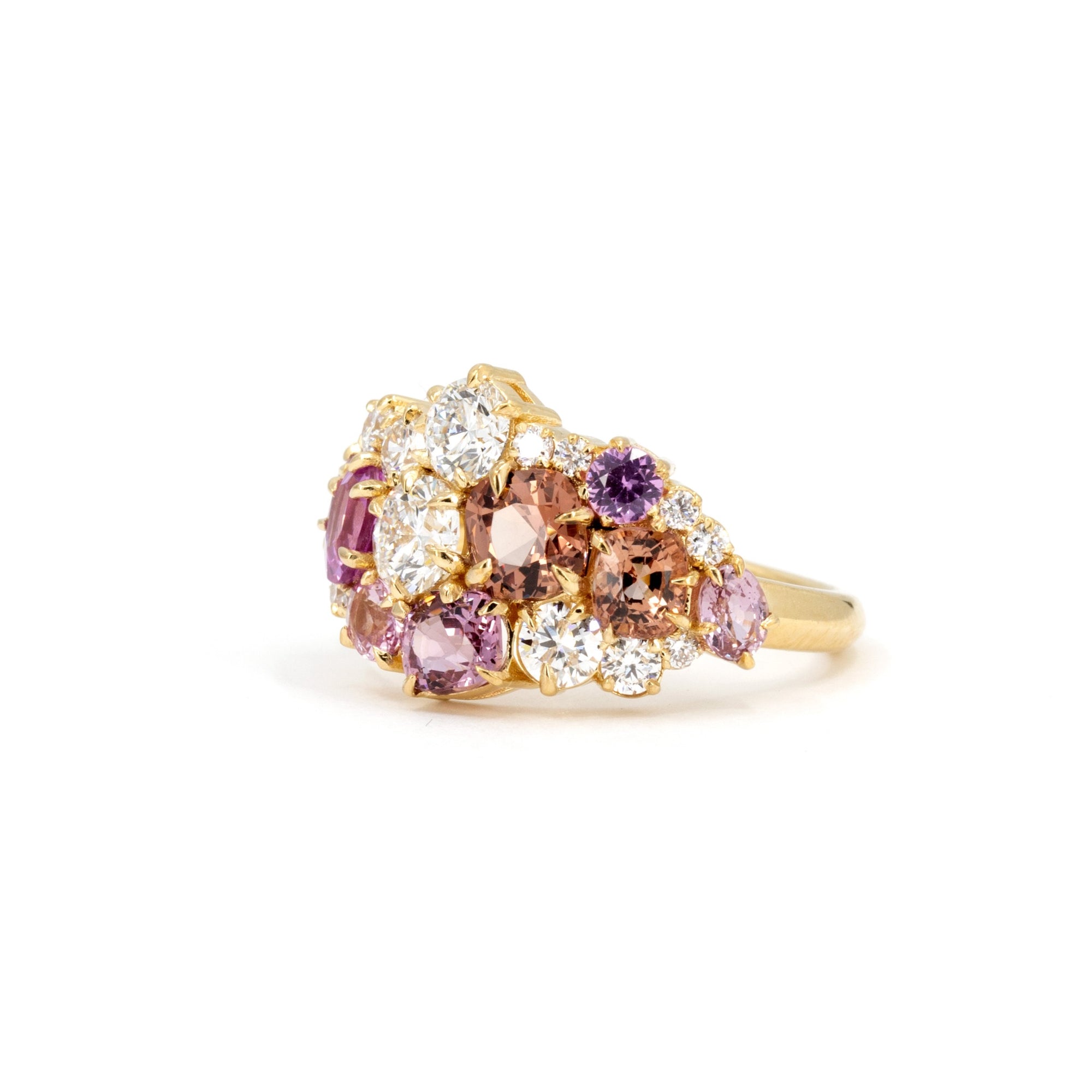 Close-up: Focuses on the vibrant peach and pink gemstone tones and the sparkle of the diamonds against the yellow gold. Made by Bena Jewelry, Montreal, Canada.