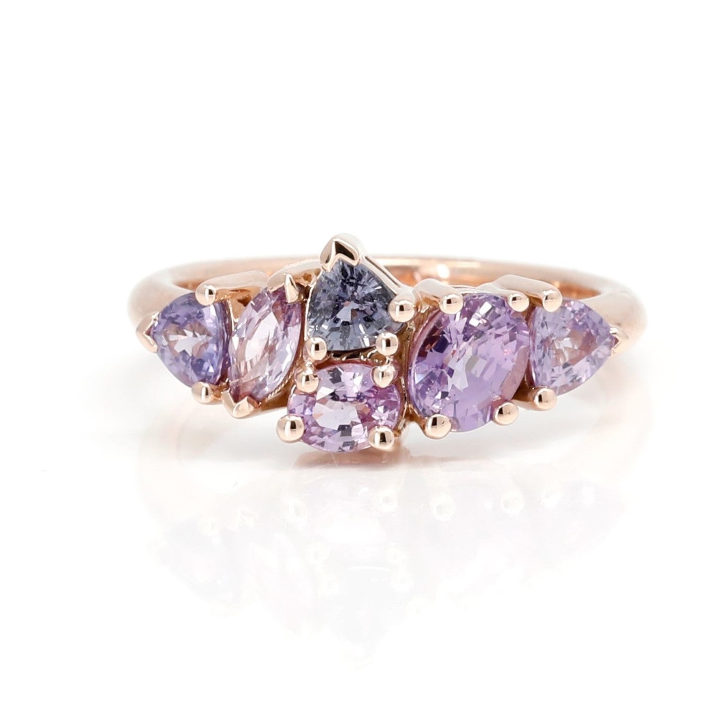 Avalanche" ring in rose gold with purple and lilac sapphires, asymmetrical design, made in Montreal by Bena Jewelry, fine contemporary jewelry.