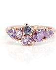 Avalanche" ring in rose gold with purple and lilac sapphires, asymmetrical design, made in Montreal by Bena Jewelry, fine contemporary jewelry.
