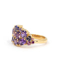 Front view: The Avalanche Deep Purple Ring against a white background, emphasizing the contrast between the deep purple sapphires and the warm yellow gold. Designed by Bena Jewelry in Montreal, Canada.