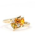 Kink Avalanche ring by Bena Jewelry featuring orange and yellow sapphires with diamonds in yellow gold, handcrafted in Montreal.