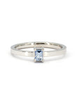 Sapphire baguette ring by Bena Jewelry, minimalist boxy design, handcrafted in Montreal with a striking blue sapphire centerpiece.