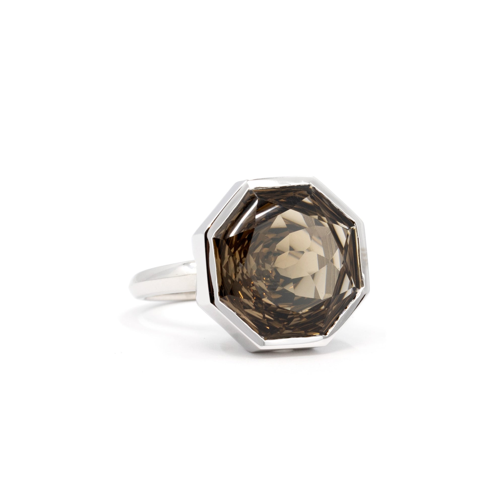 Front view of the oversized Brazilian smoky quartz cocktail ring in white gold, part of the Fancy Edgy collection by Bena Jewelry, photographed on a white surface.
