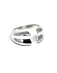 Frill Ring in White Gold on white background – A bold unisex white gold ring with a sleek, open-ended structure. Handmade in Montreal.