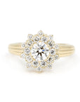 Soleil Ring with a round diamond and double halo, set in yellow gold. Handmade by Bena Jewelry in Montreal.