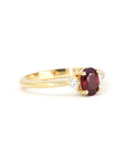 Close-up of Ruby Flame Ring – A deep red ruby with a timeless design, enhanced by sparkling diamonds for a refined look.