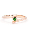 Kink Demantoid ring in rose gold with a green demantoid garnet in a bezel setting, made in Montreal by Bena Jewelry, edgy contemporary jewelry.