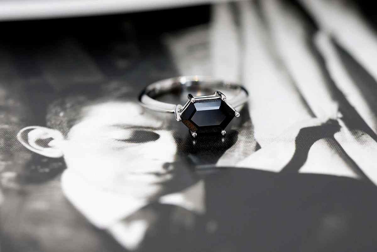 Elegant black spinel ring in white gold, showcased as modern designer jewelry by Bena Jewelry.