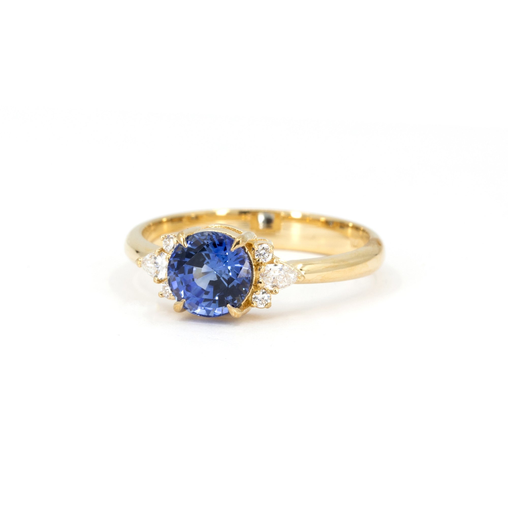 Left side of Azure Tide Sapphire & Diamond Ring – A modern yet timeless ring with a delicate balance of sapphire and diamond brilliance.