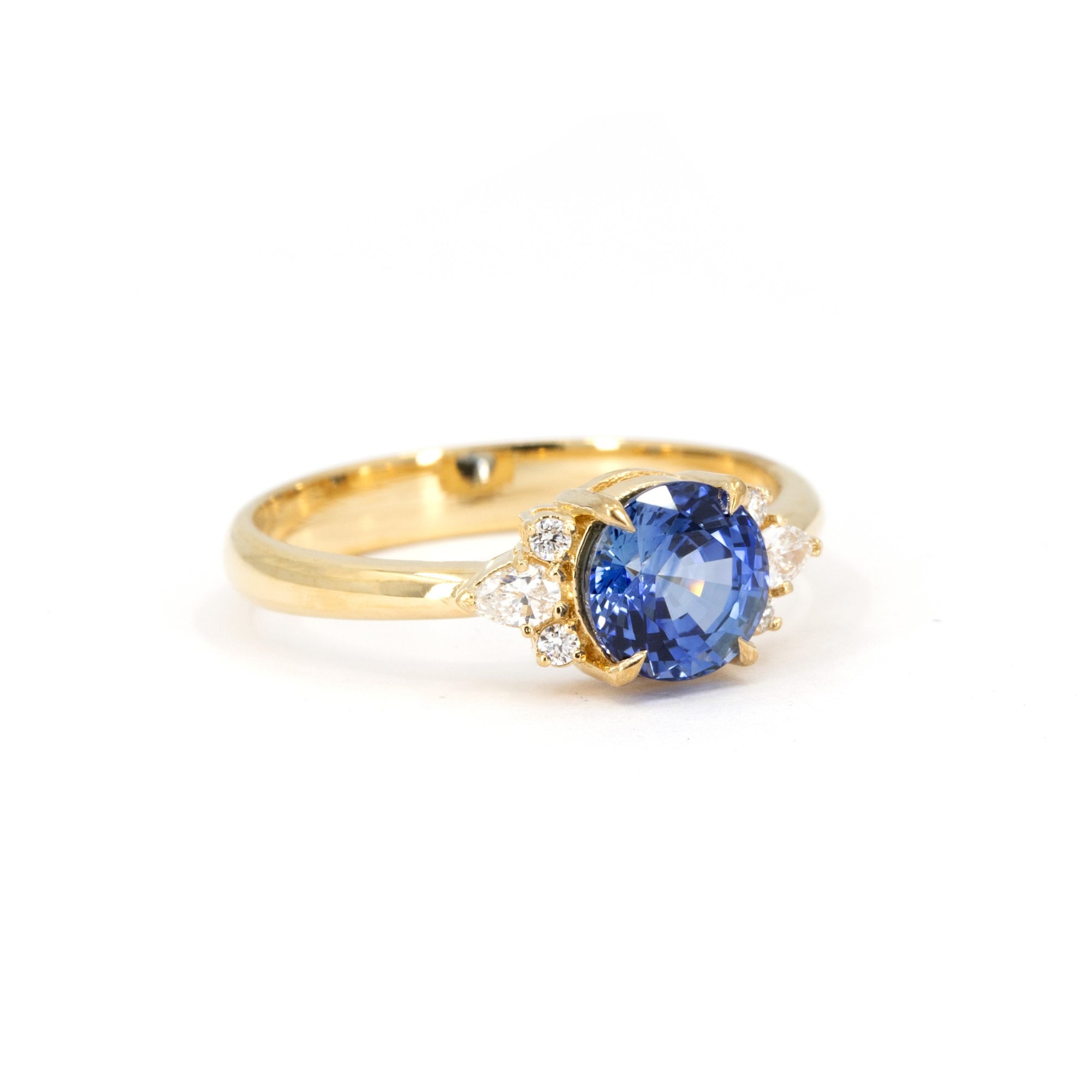 Side shot of Azure Tide Sapphire & Diamond Ring – A detailed close-up highlighting the craftsmanship and gemstone vibrancy.