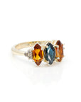 side view of marquise shape sapphire and citrine diamond bena jewelry designer ring made in montreal on white background