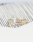 Classic white diamond wedding band set on yellow gold. Wedding jewelry made in Montreal.