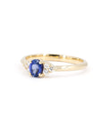 Side view of the Desir Ring, highlighting its oval-cut blue sapphire and diamond details, a fine jewelry piece from Bena Jewelry, Montreal.