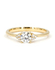 Round Diamond Desir Ring in yellow gold featuring a round-cut diamond and side accents by Bena Jewelry photographed on a clean white background custom-made in Montreal