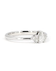 Custom-made pear-shaped diamond engagement ring in white gold, a classic and modern bridal piece handcrafted in Montreal.