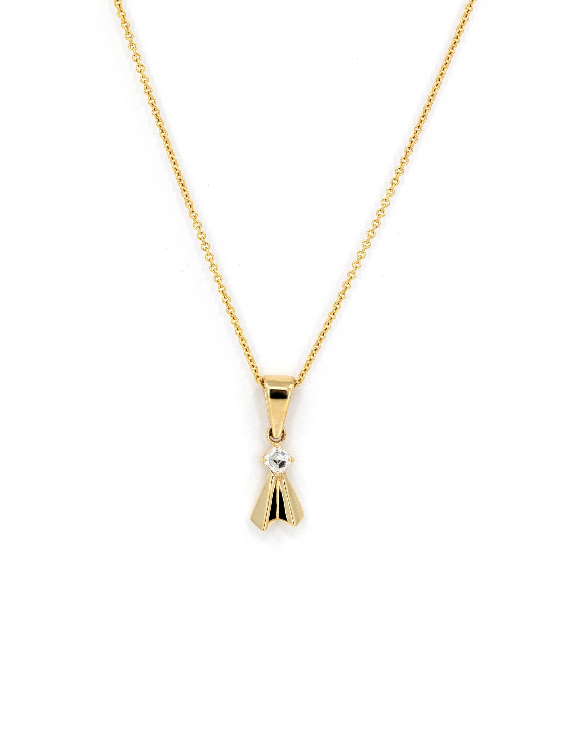 Delicate yet edgy pendant with an Asscher-cut diamond, handcrafted by Bena Jewelry in Montreal, Quebec. A bold and modern design for women seeking luxurious and unique fine jewelry made in Canada.