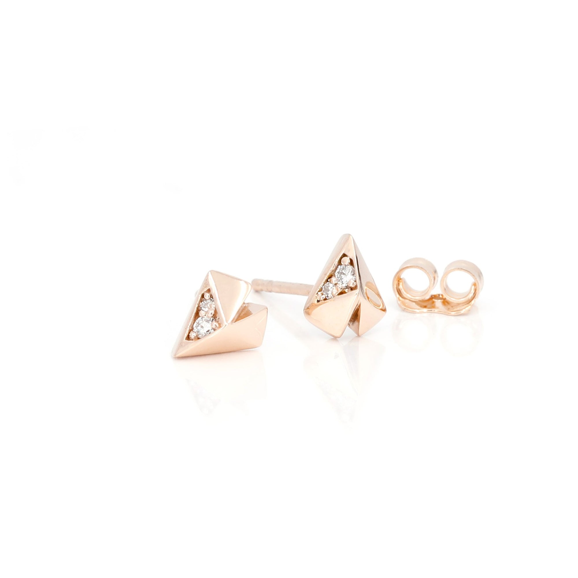 Modern rose gold diamond earrings Edgy Diamond Heart Studs by Bena Jewelry displayed on a clean white background fine jewelry custom-made in Canada