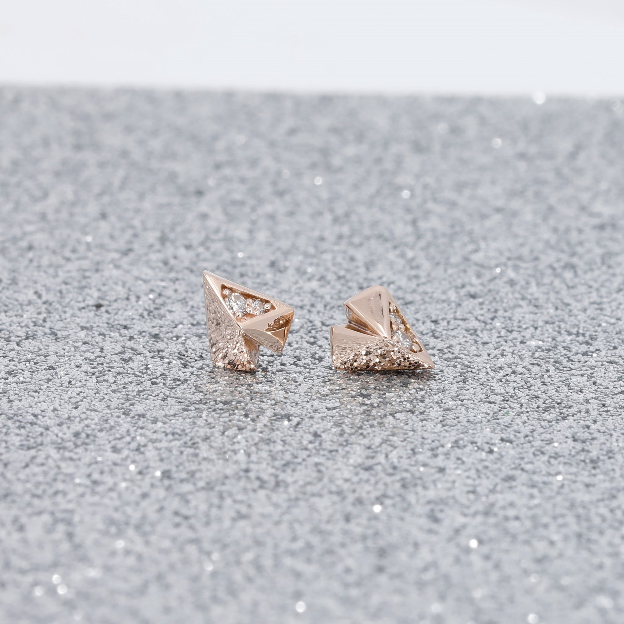 Unique heart-shaped earrings with a geometric design in rose gold and diamonds Edgy Diamond Heart Studs by Bena Jewelry