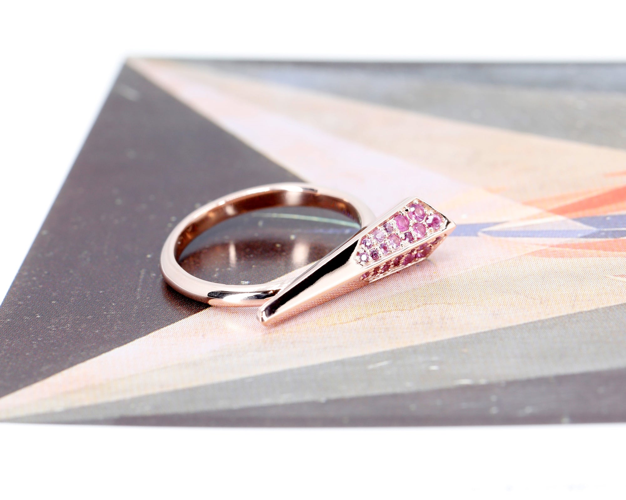 Unisex Pink Sapphire Spine Ring featuring vibrant pink sapphires in rose gold, part of the Fancy Edgy collection by Bena Jewelry.