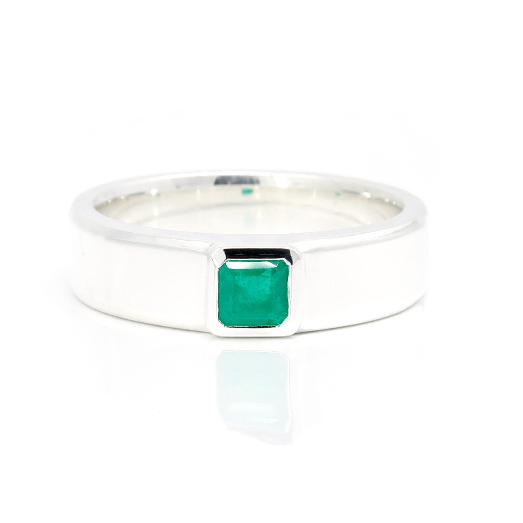 edgy emerald silver men ring custom made in montreal by bena jewelry edgy designer from canada on white background