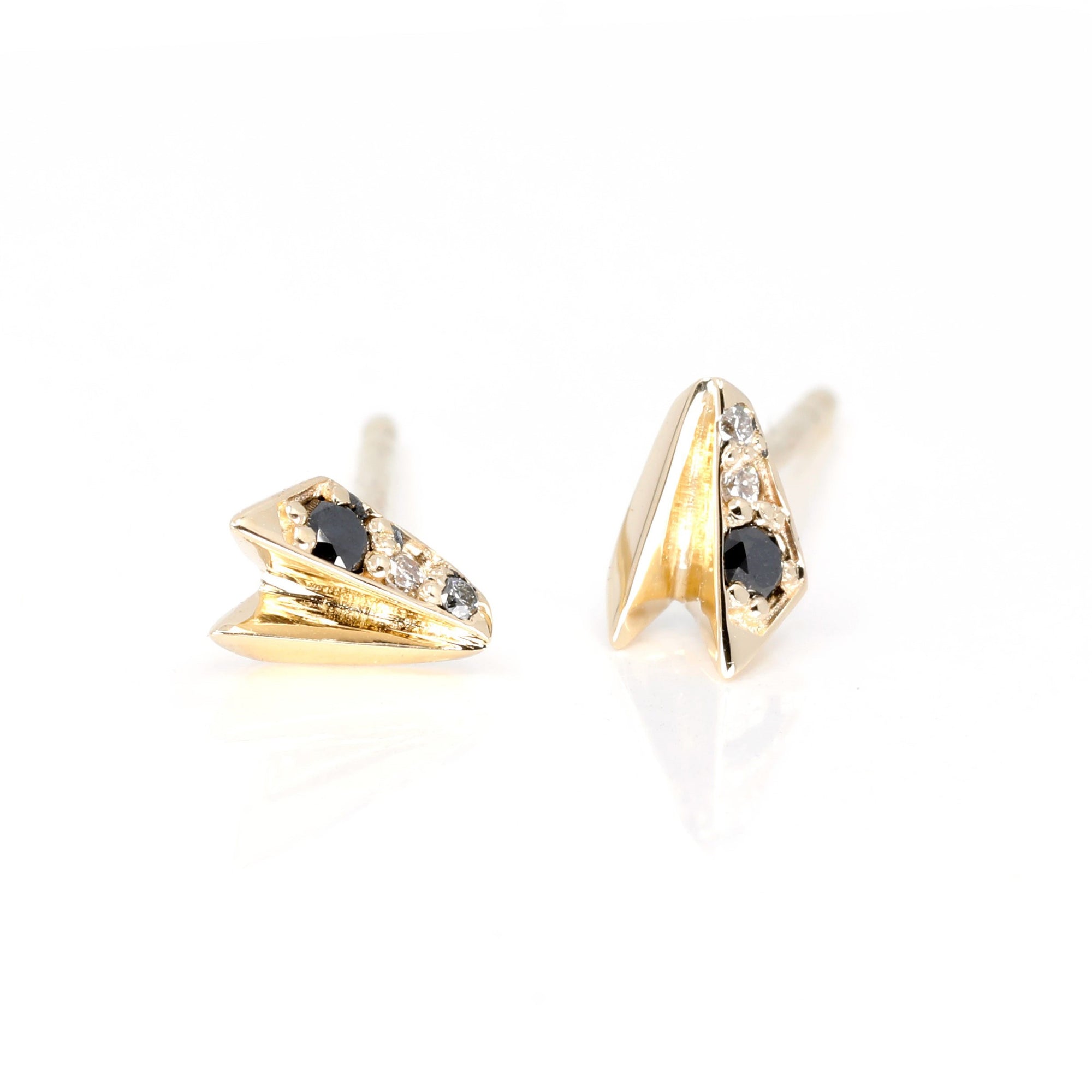Edges Diamond Studs in yellow gold featuring black and white diamonds, minimalist design by Bena Jewelry in Montreal.