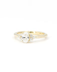 front view of bena jewelry lab grown diamond oval shape engagement ring custom made in montreal on white background