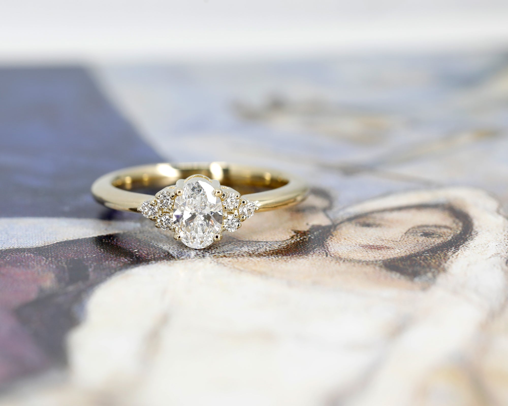 lab grown diamond engagement ring montreal made in yellow gold by bena jewelry designer on multi color background