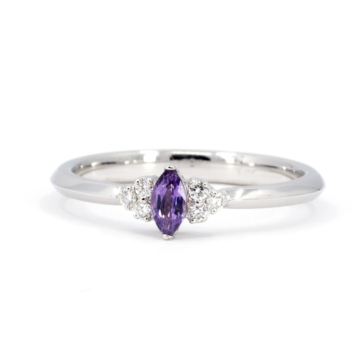 Désir Ring with Marquise Purple Sapphire & Diamonds, handcrafted by Bena Jewelry in Montreal – A delicate engagement ring featuring a vibrant sapphire and sparkling diamonds, set in white gold.