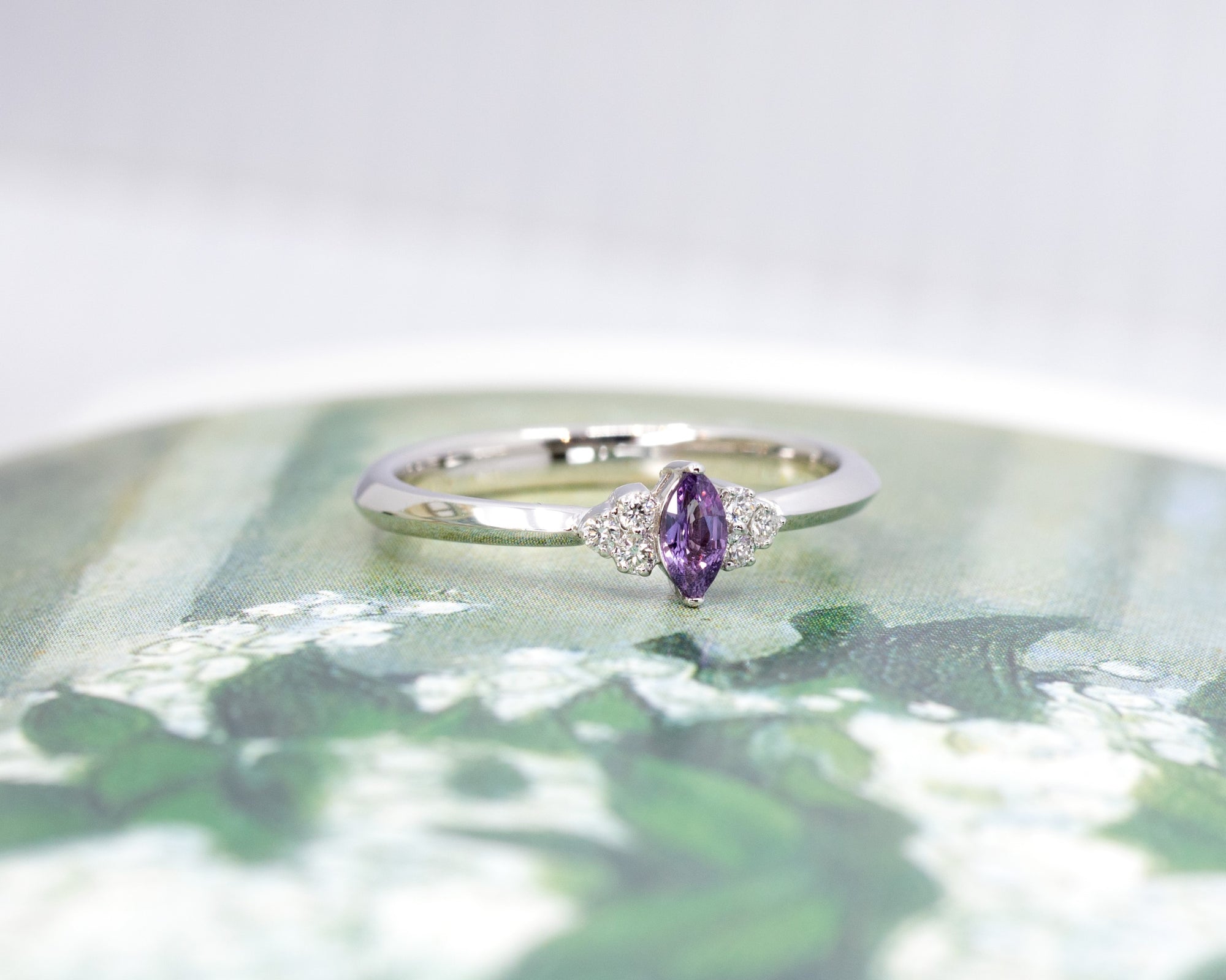 Side view of the Marquise Sapphire & Diamond Ring, made in Canada – A custom fine jewelry piece with a graceful silhouette, designed for modern brides.