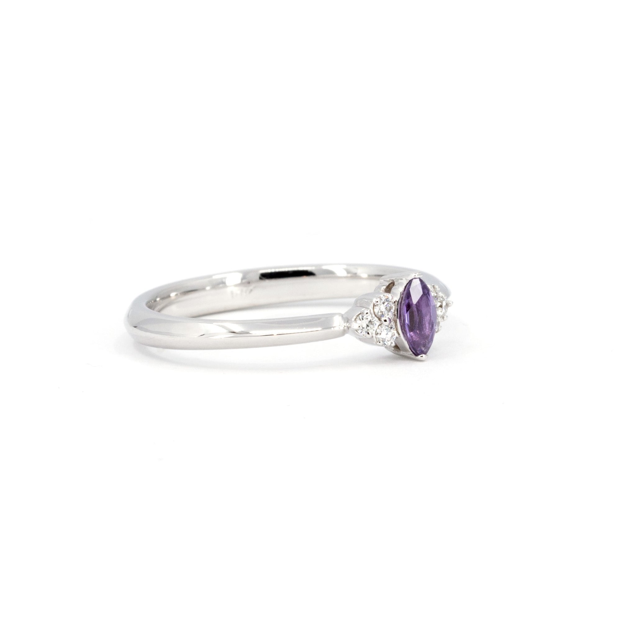 Marquise Sapphire & Diamond Ring worn on the hand, a unique engagement piece by Bena Jewelry – A handcrafted wedding ring made in Montreal with ethically sourced gemstones.