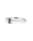 Désir Ring styled as a delicate bridal piece, made in Canada – A modern yet timeless design, featuring a vibrant purple sapphire.