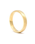 Matte gold men’s wedding band in yellow gold, handcrafted by Bena Jewelry in Montreal.