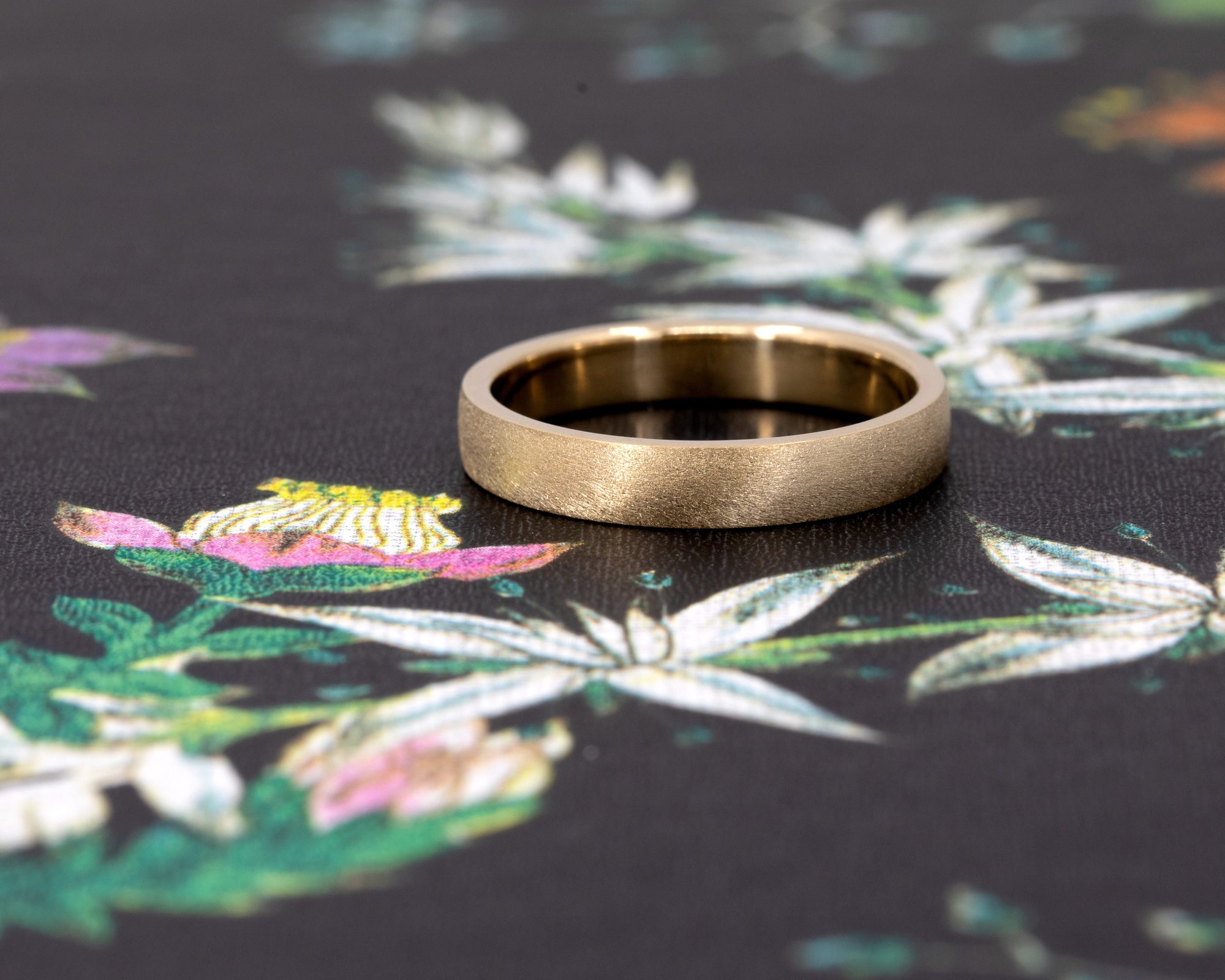 Custom yellow gold wedding band with a matte finish, a timeless men’s ring handmade in Montreal.