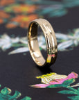 Close-up of the Evergold Wedding Band, designed in Montreal by Bena Jewelry – A timeless and sophisticated wedding band, perfect for modern grooms.