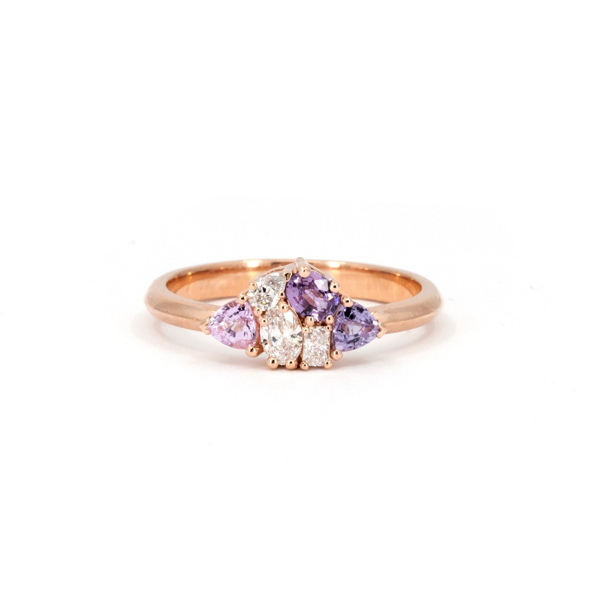 Front view of the Avalanche ring by Bena Jewelry, highlighting the fine craftsmanship of the 14 kt rose gold setting with pink and purple sapphires and diamonds.