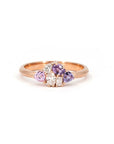 Front view of the Avalanche ring by Bena Jewelry, highlighting the fine craftsmanship of the 14 kt rose gold setting with pink and purple sapphires and diamonds.