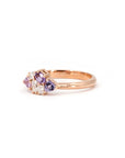 Avalanche ring by Bena Jewelry worn on hand, featuring pink and purple sapphires and diamonds in 14 kt rose gold, designed in Montreal.