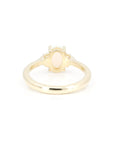 back view of yellow gold custom made engagement ring montreal bena jewelry on white background