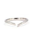 Minimalist open ring in white gold, designed by Bena Jewelry. Sleek and modern, this open-ended band has a polished finish and a contemporary edge. Handmade in Montreal, Canada.