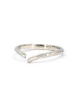 Close-up of the Sleek Gap Ring in 14k white gold. This minimalist open band features a smooth, polished surface and an architectural design. Crafted by Bena Jewelry in Montreal.