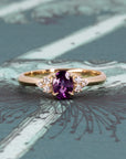 Detailed view of the Desir Ring, highlighting the sparkle of its purple-pink sapphire and diamonds, a fine jewelry piece from Bena Jewelry, Montreal.